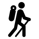 hiker with walking stick and backpack
